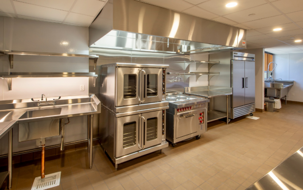 Spotless commercial kitchen after cleaning